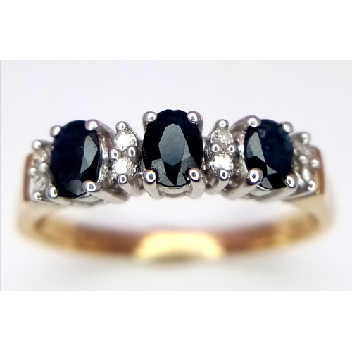 439 - A 9K Yellow Gold Diamond and Sapphire Ring. Size N. 0.08ctw diamonds, 0.90ctw sapphires, 1.9g total ... 