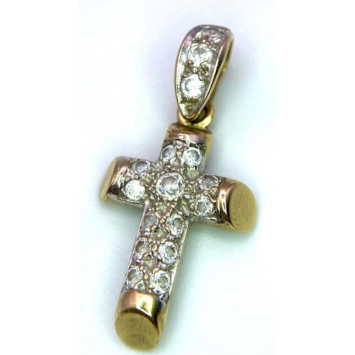 447 - 9K Yellow Gold Stone Set Cross Pendant.
Measures 2cm.
Weight: 2.3g
SC-3076