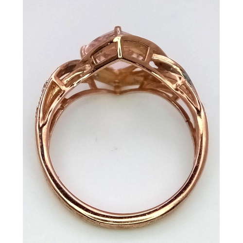 516 - A 9K Rose Gold Diamond and Rose Quartz Dress Ring,. Size M. 0.20ctw diamonds, 2.6g total weight.