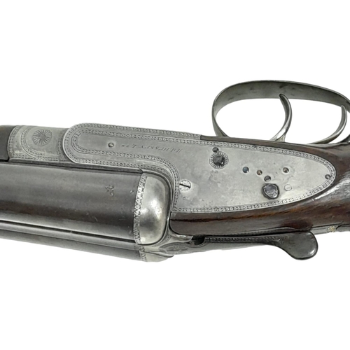 521 - A 12 GUAGE DOUBLE BARELLED SAWN OFF SHOTGUN MADE BY H.J.HUSSEY WITH SHORTENED STOCK .
COMES WITH CUR... 