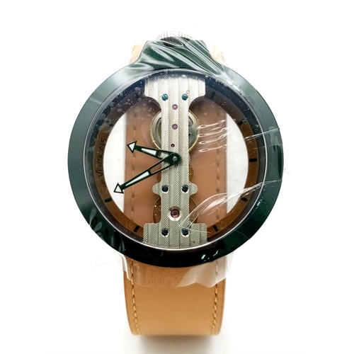 567 - Atto Verticale Masera Mechanical Skeleton Watch.
Tanned Leather strap with a rich green underside.
A... 