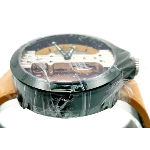 567 - Atto Verticale Masera Mechanical Skeleton Watch.
Tanned Leather strap with a rich green underside.
A... 