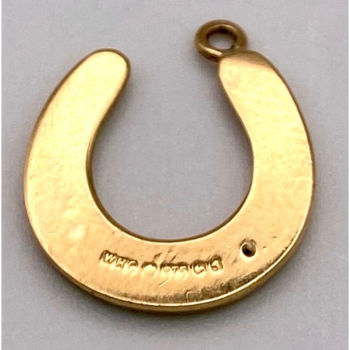 574 - A 9K Yellow Gold Horse-Shoe Pendant/Charm. 15mm.