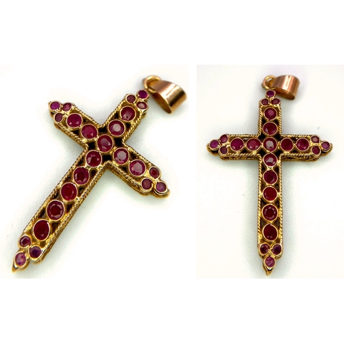 672 - 9K Yellow Gold, Sapphire & Ruby Set Double Cross Pendant.
Measures 2.5cm long.
Weight: 1.3g
SC-3054