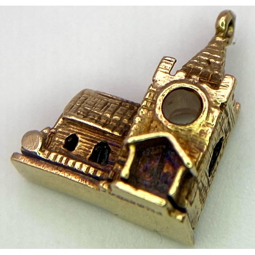 746 - A 9K Yellow Gold Church Charm/Pendant. 16mm. 3g weight.