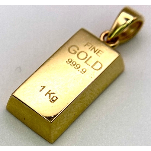 770 - A 9K Yellow Gold Ingot Bar Pendant. 2mm length, 1.6g total weight.