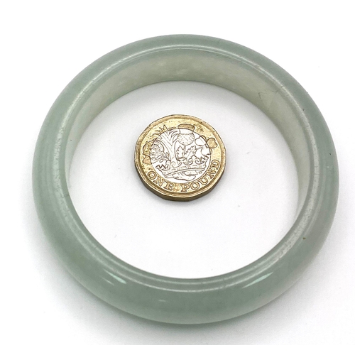 836 - A classic Jadeite Bangle.
7cm in diameter.
Weight: 57.4g