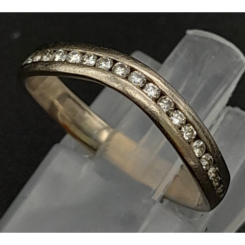 429 - An 18K White Gold Diamond Half Eternity Wave Ring. Size L. 2.62g total weight. Ref: 14505