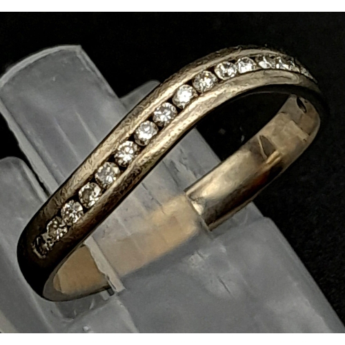 429 - An 18K White Gold Diamond Half Eternity Wave Ring. Size L. 2.62g total weight. Ref: 14505