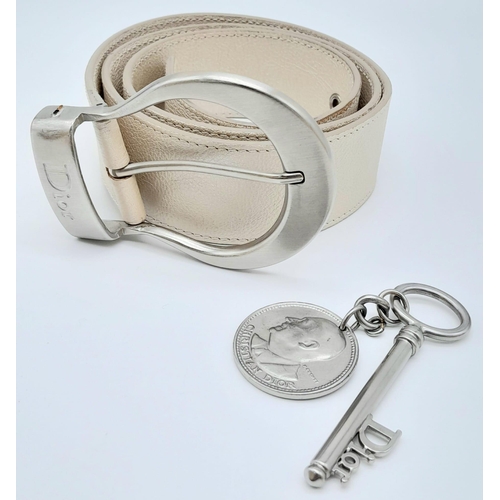 704 - Stylish Christian Dior Leather Belt. Made in Italy, this pearlescent ivory white CD belt measures 93... 