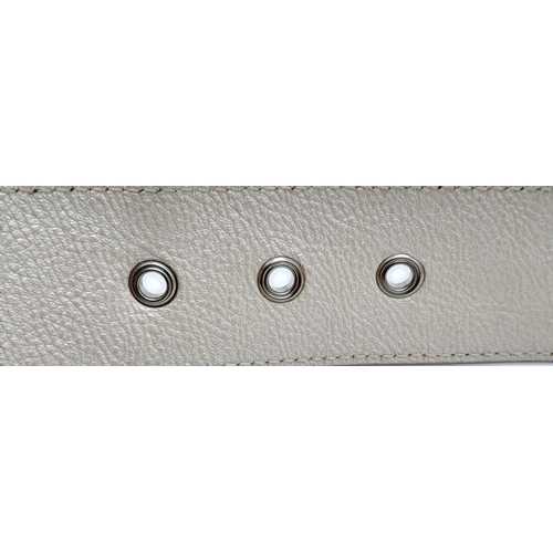 704 - Stylish Christian Dior Leather Belt. Made in Italy, this pearlescent ivory white CD belt measures 93... 