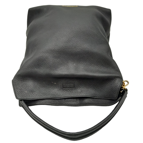 144 - A Burberry Black Cale Hobo Bag. A leather exterior with a looping shoulder strap, gold tone hardware... 