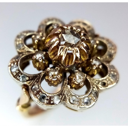 151 - A 14K YELLOW GOLD VINTAGE DIAMOND RING, OLD CUT DIAMONDS IN THE FLORAL DESIGN SETTING.  SIZE M/N. TO... 