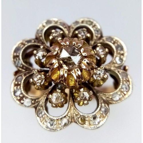 151 - A 14K YELLOW GOLD VINTAGE DIAMOND RING, OLD CUT DIAMONDS IN THE FLORAL DESIGN SETTING.  SIZE M/N. TO... 