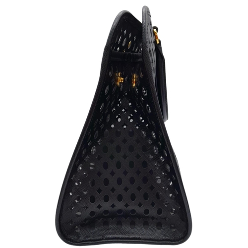 304 - A Prada Black Perforated Satchel Bag. Saffiano fori leather exterior, with an open top, two rolled h... 