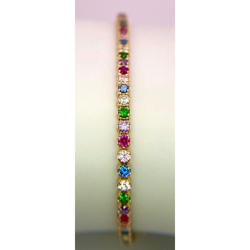 314 - A 14K YELLOW GOLD MULTI COLOUR STONE TENNIS BRACELET 2.7G. Length: 18.5CM