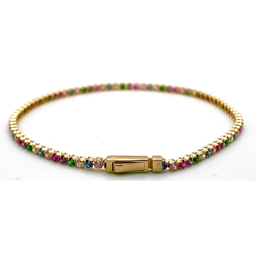 314 - A 14K YELLOW GOLD MULTI COLOUR STONE TENNIS BRACELET 2.7G. Length: 18.5CM