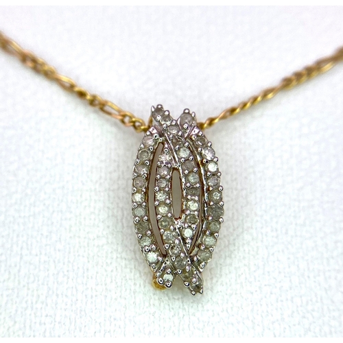 397 - A 9K Yellow Gold Diamond Set Pendant on a Fine Figaro Chain Necklace. 13mm and 47cm, 1.9g total weig... 