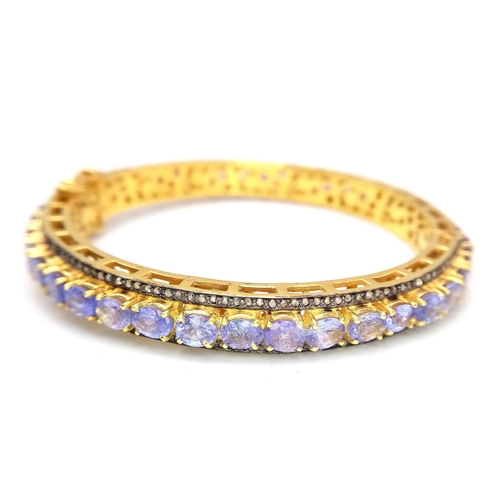 46 - A Sensational Gilded 925 Silver Tanzanite and Diamond Gemstone Tennis Bracelet. Clip open design. 55... 