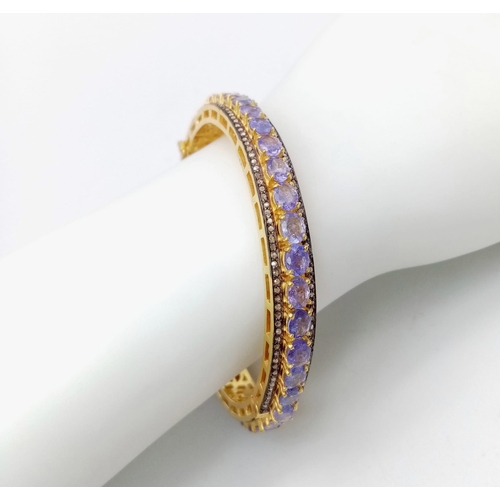 46 - A Sensational Gilded 925 Silver Tanzanite and Diamond Gemstone Tennis Bracelet. Clip open design. 55... 