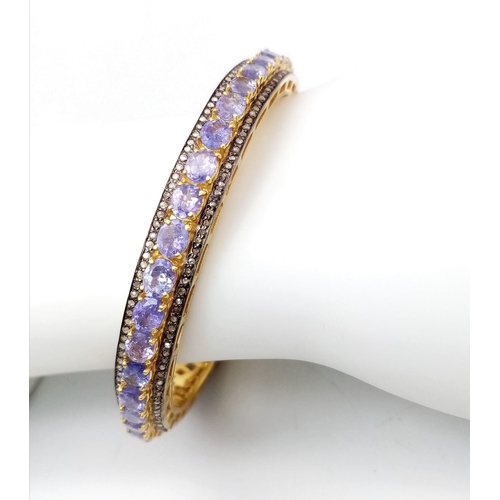 46 - A Sensational Gilded 925 Silver Tanzanite and Diamond Gemstone Tennis Bracelet. Clip open design. 55... 