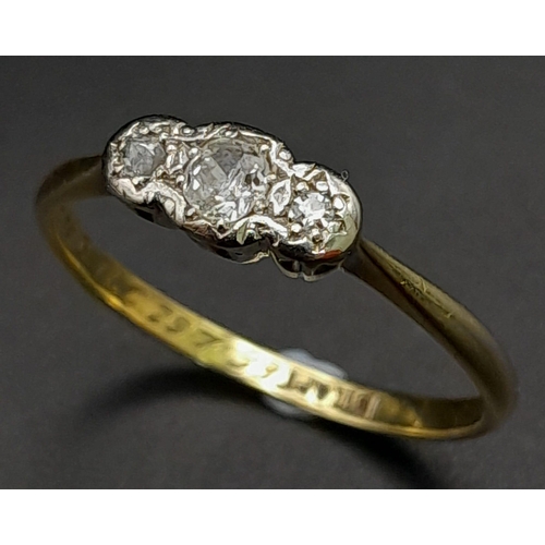 552 - A 18K YELLOW GOLD & PLATINUM VINTAGE 3 STONE RING, WITH OLD CUT DIAMONDS. ENGRAVED INSIDE 1939 2.2G ... 