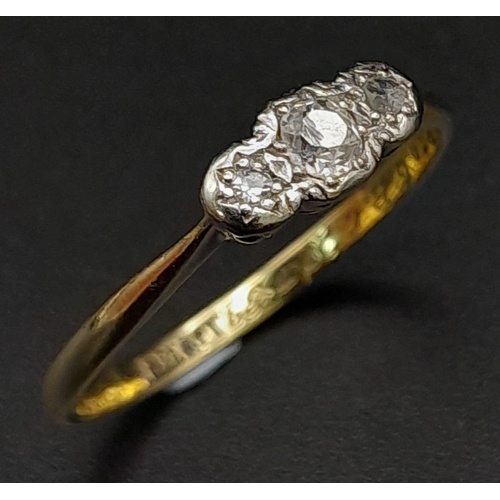 552 - A 18K YELLOW GOLD & PLATINUM VINTAGE 3 STONE RING, WITH OLD CUT DIAMONDS. ENGRAVED INSIDE 1939 2.2G ... 