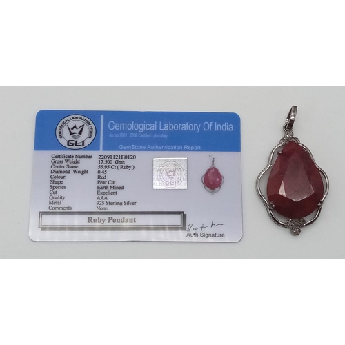 708 - A 55.95ct Ruby Teardrop Pendant with 0.45ctw of Diamond Accents. 17.5g total weight. 5.5cm. Comes wi... 