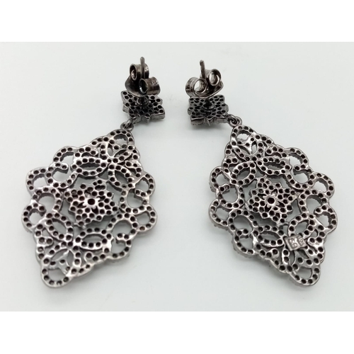 722 - A Pair of Old-Cut Diamond Art-Deco Style Earrings set in 925 Silver. Pave diamond setting with two r... 