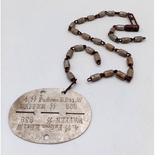 524 - WW2 GERMAN Waffen SS Panzer Grenadier’s Dog Tag. A Mauser K-98 Pull through was being used as the ne... 