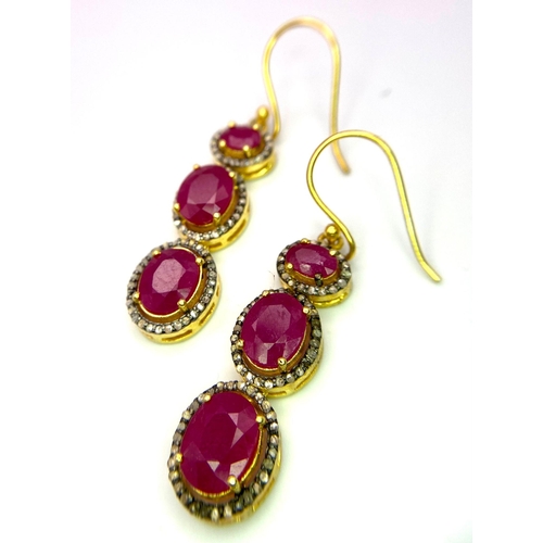 32 - A Pair of Ruby and Diamond Dangler Earrings set in Gilded 925 Silver. Ruby - 10ctw. 4cm drop. 8.62g ... 