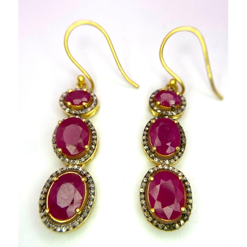 32 - A Pair of Ruby and Diamond Dangler Earrings set in Gilded 925 Silver. Ruby - 10ctw. 4cm drop. 8.62g ... 