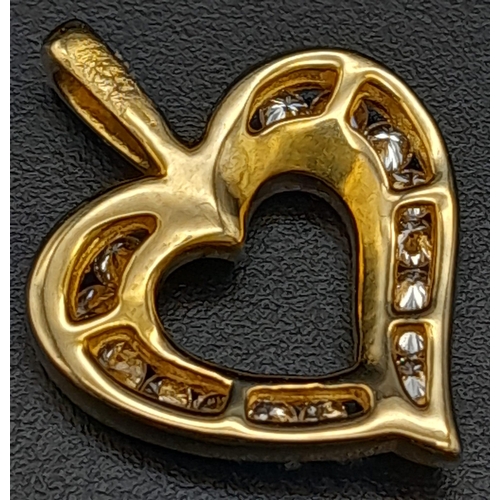 395 - A 18K YELLOW GOLD DIAMOND SET OPEN HEART PENDANT 0.20CT 2.1G 28mm x 14mm