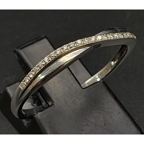 648 - A 9K WHITE GOLD DIAMOND TWIST BAND RING ( 1 SMALL DIAMOND MISSING, NOT NOTICABLE) 1.7G SIZE S