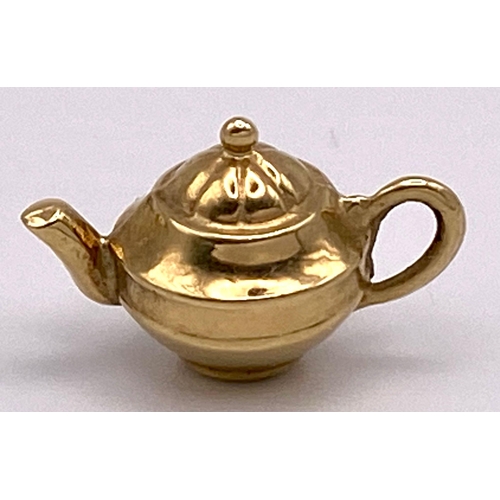 753 - A 9K Yellow Gold Teapot Pendant/Charm. 15mm. 0.56g weight.