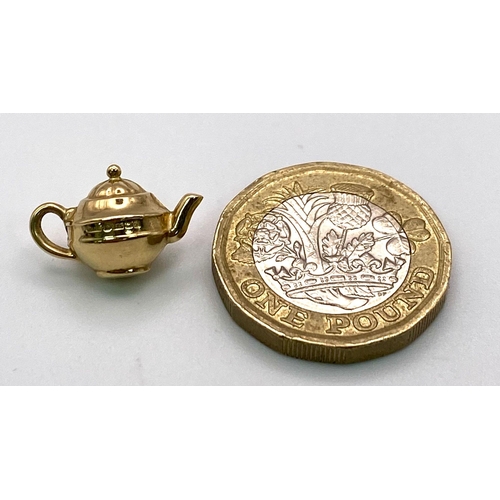 753 - A 9K Yellow Gold Teapot Pendant/Charm. 15mm. 0.56g weight.