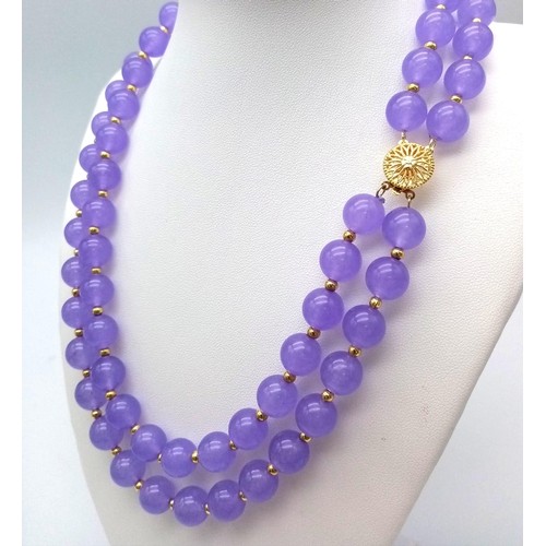 389 - A Gorgeous Lavender Jade Two Row Beaded Necklace. 10mm beads with gilded spacers and clasp. 44cm nec... 