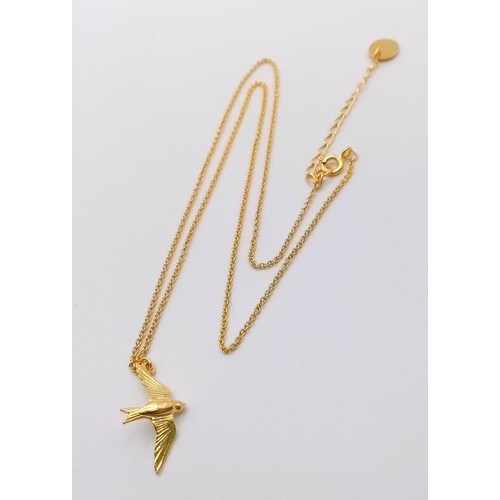 949 - An Alex Monroe sterling silver with 18k gold vermeil swallow necklace on 18