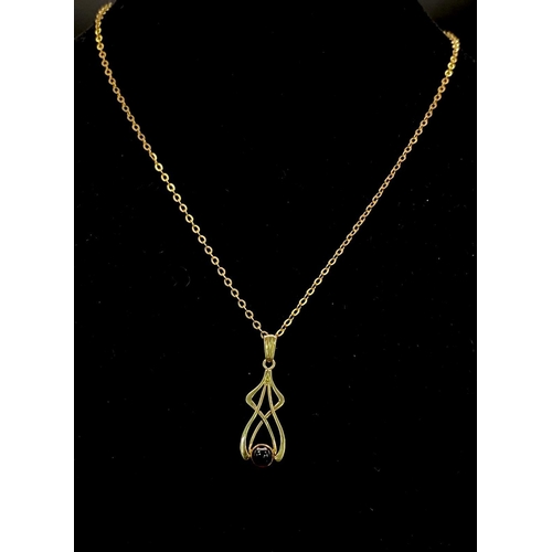 660 - An Antique 9K Yellow Gold Necklace with a Lavalier 9K Gold and Ruby Pendant. 42cm necklace length. 4... 