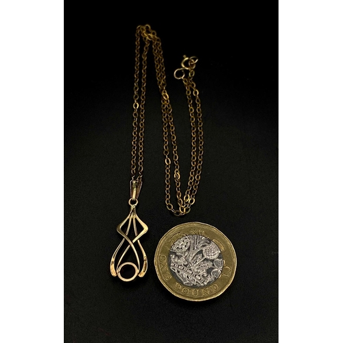 660 - An Antique 9K Yellow Gold Necklace with a Lavalier 9K Gold and Ruby Pendant. 42cm necklace length. 4... 