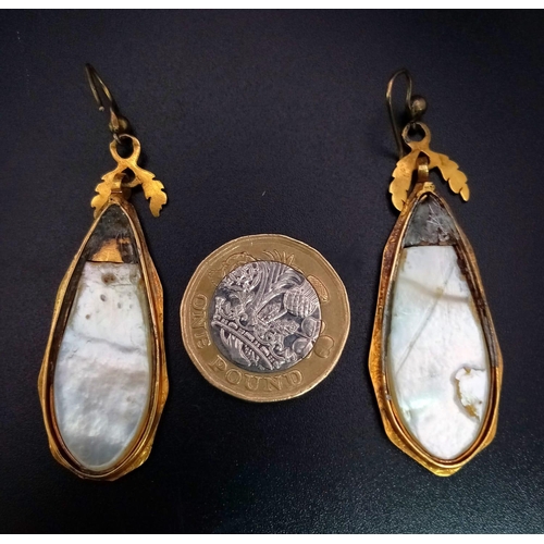 961 - A Pair of Antique Mid-Karat Gold Mother of Pearl Hand-Carved Drop Earrings - depicts an ancient King... 