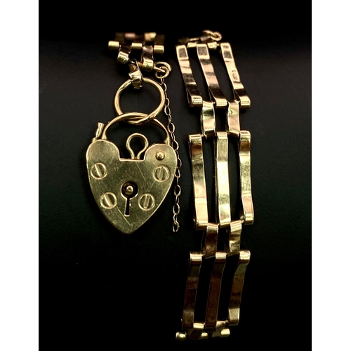 941 - A VINTAGE 9K GOLD 3 ROW GATE BRACELET WITH HEART PADLOCK .  6.9gms