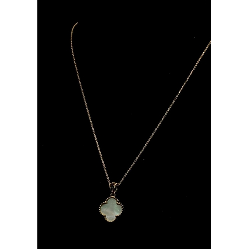 963 - An 18K Gold and Mother of Pearl Clover Pendant on a Disappearing 18K Yellow Gold Necklace. 2cm and 4... 