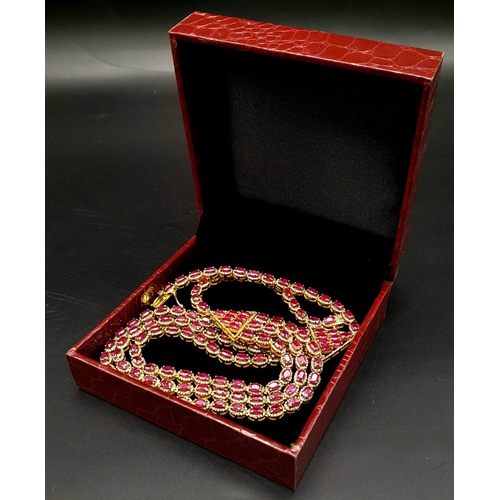 29 - An Asian-Inspired Three Row Ruby and Diamond Necklace -with 33ctw of Rubies and with 3ctw Approx of ... 