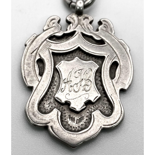 431 - An Antique Sterling Silver Albert Chain with Monogram Fob. 
Hallmarks for Birmingham 1923. 43g weigh... 