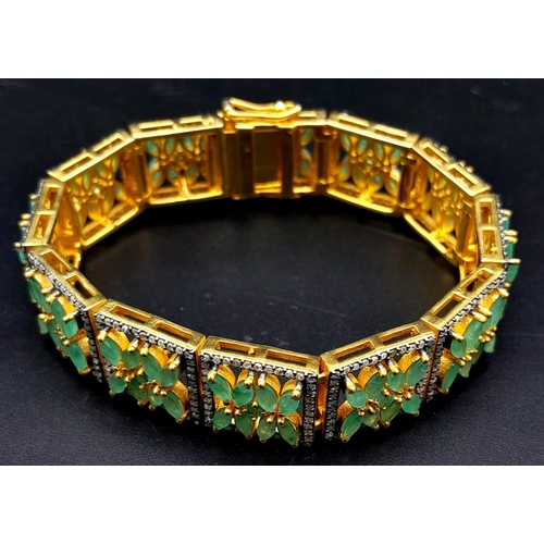 603 - An Emerald and Diamond Gemstone Tennis Bracelet set in  Gilded 925 Silver. Floral design. Old cut Di... 