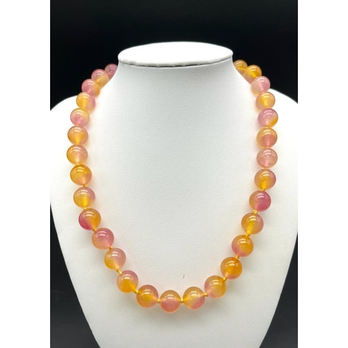 668 - A Colourful Large Purple and Yellow Jade Beaded Necklace. 12mm beads. Heart clasp. 44cm necklace len... 