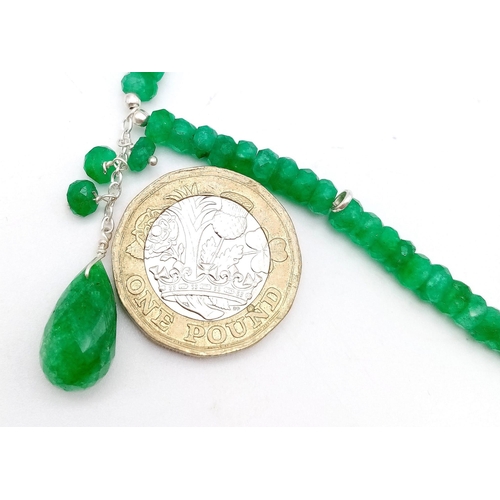 717 - An 80ctw Emerald Small Bead Necklace with Emerald Drop. 925 silver clasp. 42cm necklace length.