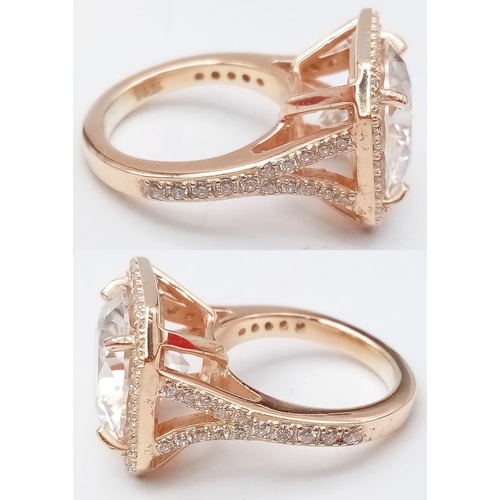 883 - A 10.35ct Sparkling White Moissanite Ring set in Rose Gold Gilded 925 Silver. Size O. 10.22g total w... 