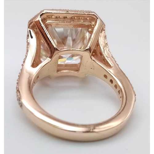 883 - A 10.35ct Sparkling White Moissanite Ring set in Rose Gold Gilded 925 Silver. Size O. 10.22g total w... 